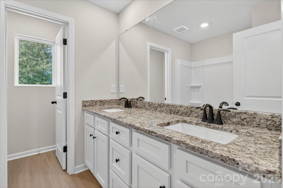 Furnished interior view inside a new home in Stagecoach Station, Gastonia (Image 6).