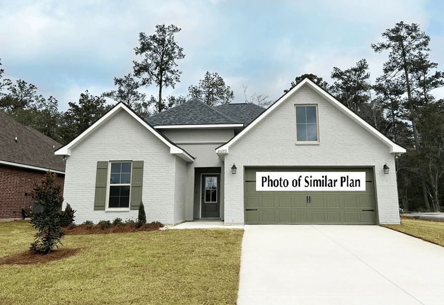 Front exterior of a new home in Sentinel Ridge, Pace, FL, highlighting curb appeal (Image 2).