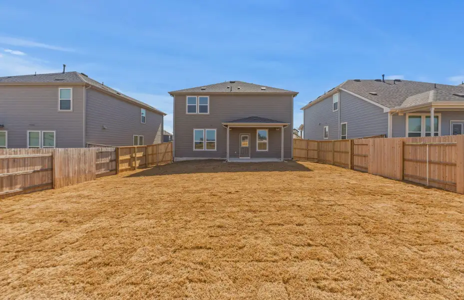 Exterior details and patio area of a home in Patterson Ranch, Georgetown (Image 19).
