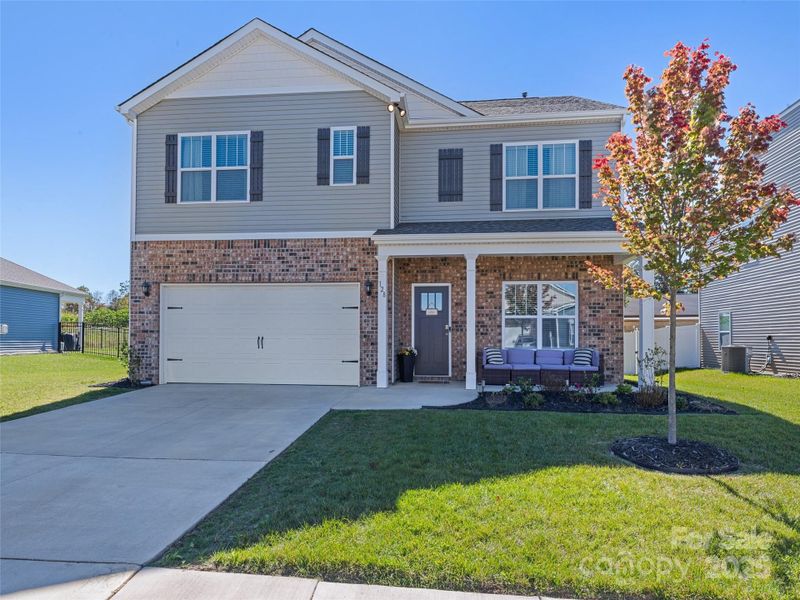 Exterior details and patio area of a home in , Fletcher (Image 19). Exterior details and patio area of a home in , Fletcher (Image 19).
