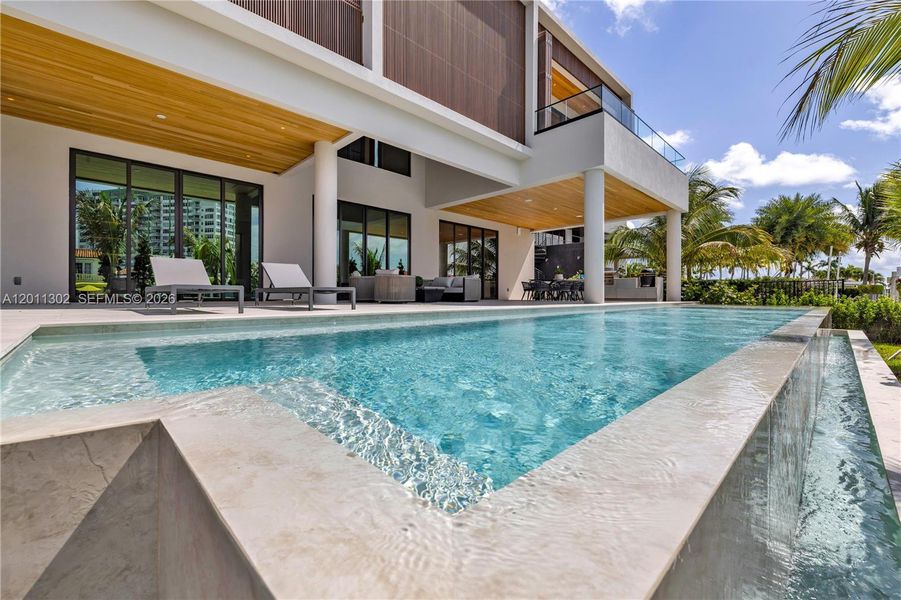 Exterior details and patio area of a home in , North Miami (Image 2).