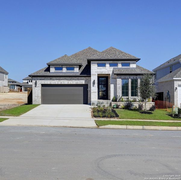 Front exterior of a new home in Corley Farms 50', Boerne, TX, highlighting curb appeal (Image 2).
