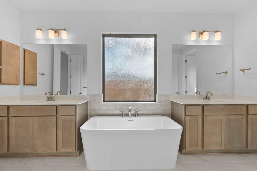 Primary Bath retreat with dual vanities & soaking tub Primary Bath retreat with dual vanities & soaking tub