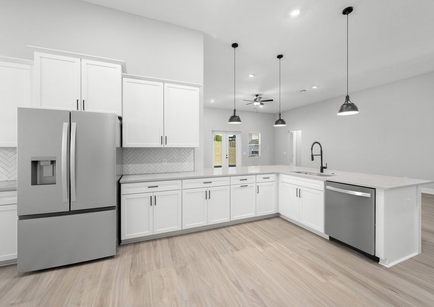 Stainless steel appliances are included.