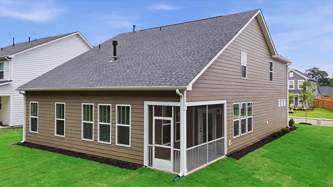Established charm meets functional outdoor living with a screened-in porch located in Anderson, SC