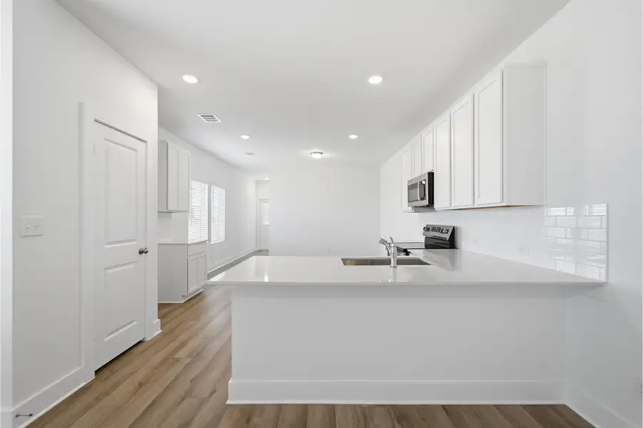 Representative furnished interior of a home built from the Hazel by CastleRock Communities in Katzer Ranch, Converse (Image 6).