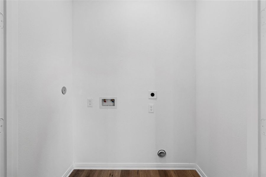 Full size walk in laundry room for convenience located upstairs on the second floor.