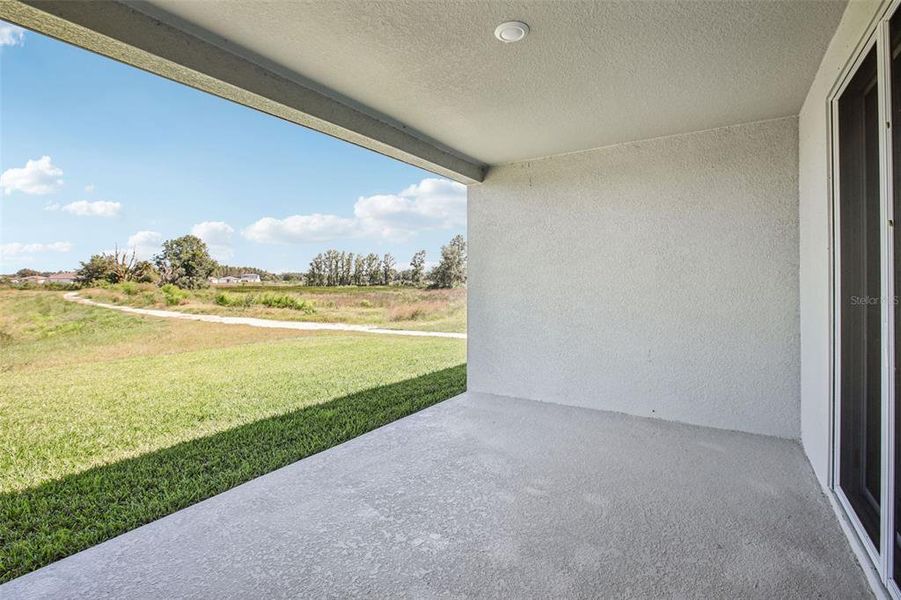 Exterior details and patio area of a home in Two Rivers - Signature Series, Zephyrhills (Image 4).
