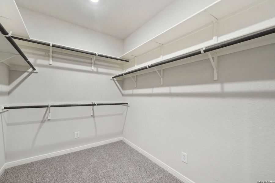 Spacious, unfurnished interior of a new home in Estancia Ranch - Classic Series, San Antonio (Image 24).