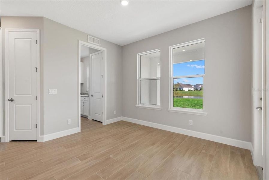 Spacious, unfurnished interior of a new home in Park East at Azario, Bradenton (Image 58). Spacious, unfurnished interior of a new home in Park East at Azario, Bradenton (Image 58).