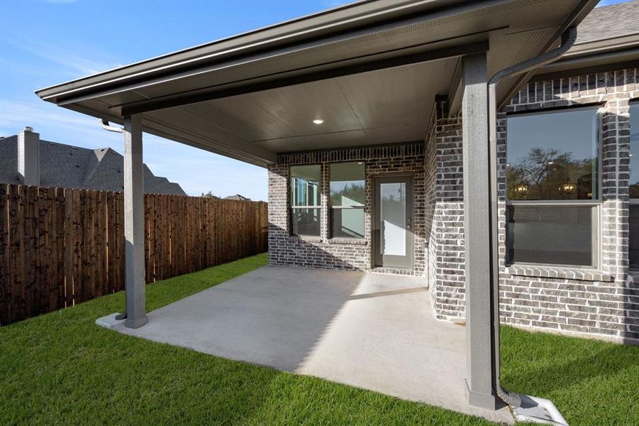Exterior details and patio area of a home in Mockingbird Hills, Joshua (Image 4). Exterior details and patio area of a home in Mockingbird Hills, Joshua (Image 4).
