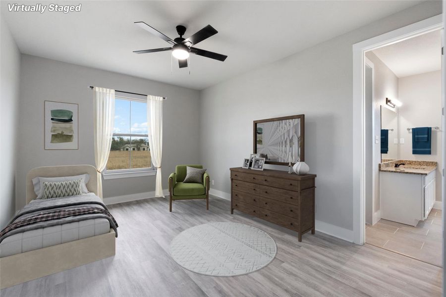 Living area featuring light wood-type flooring and a ceiling fan