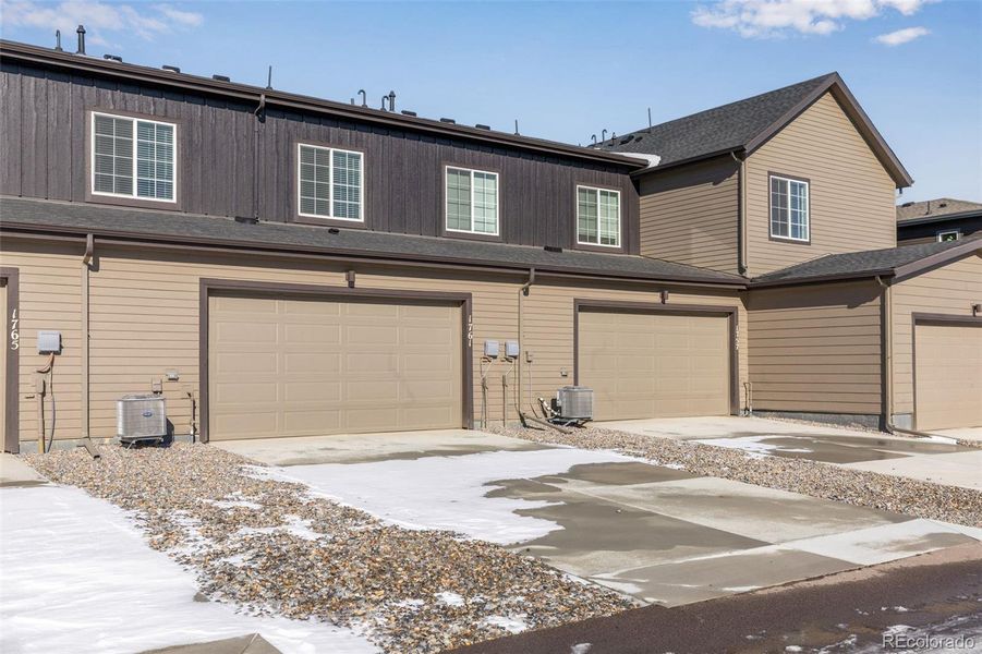 Exterior details and patio area of a home in Westside Crossing, Berthoud (Image 3).