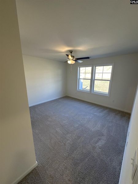 Spacious, unfurnished interior of a new home in Piney Woods Bluff, Columbia (Image 12).