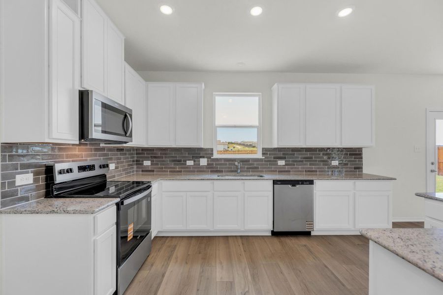 Furnished interior view inside a new home in Sonterra - Cool Water, Jarrell (Image 6).