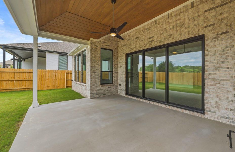 Exterior details and patio area of a home in 6 Creeks, Kyle (Image 20).