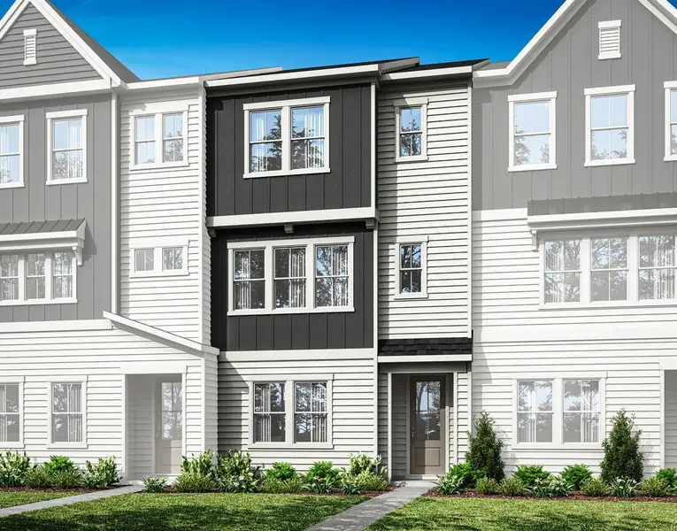 Front exterior of a new home in Twinleaf Townes, Chapel Hill, NC, highlighting curb appeal (Image 1). Front exterior of a new home in Twinleaf Townes, Chapel Hill, NC, highlighting curb appeal (Image 1).