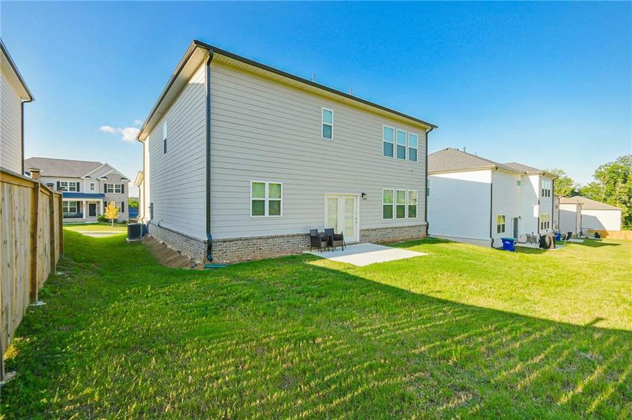 Front exterior of a new home in , South Fulton, GA, highlighting curb appeal (Image 20). Front exterior of a new home in , South Fulton, GA, highlighting curb appeal (Image 20).