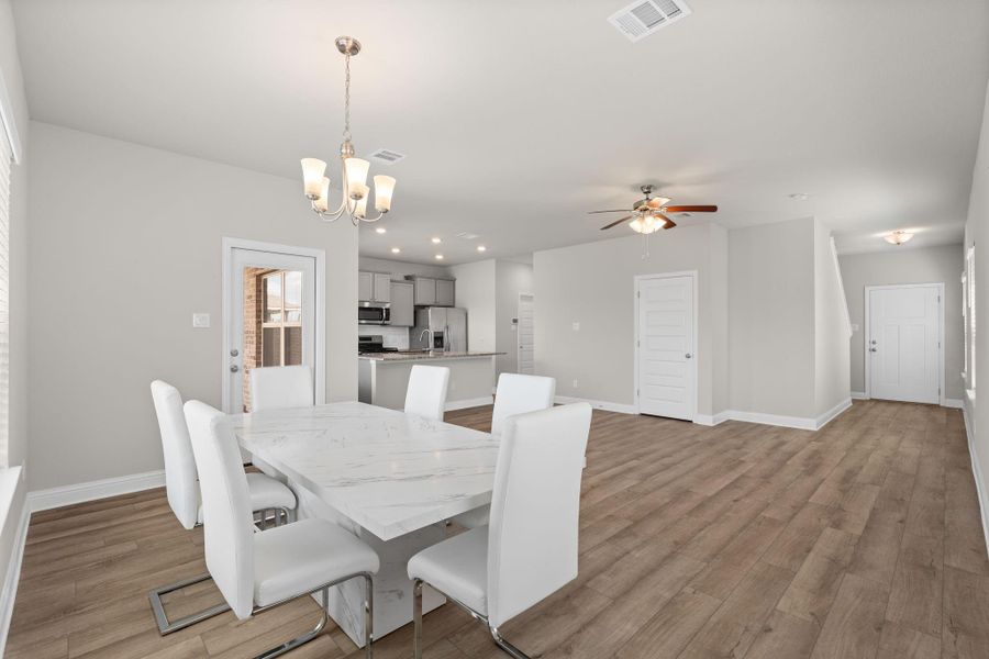 Furnished interior view inside a new home in Sunterra, Katy (Image 11).