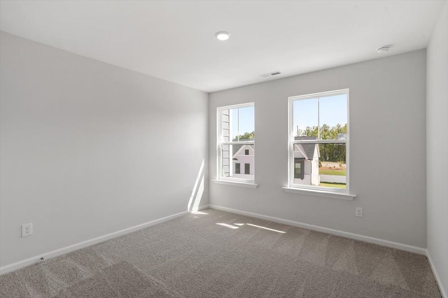 Spacious, unfurnished interior of a new home in Sweetbrier, Durham (Image 28).