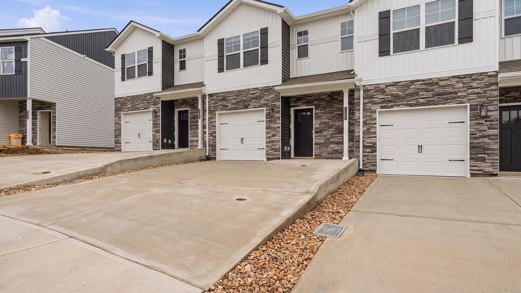 Exterior details and patio area of a home in The Arbor Townhomes, Kingsport (Image 3).