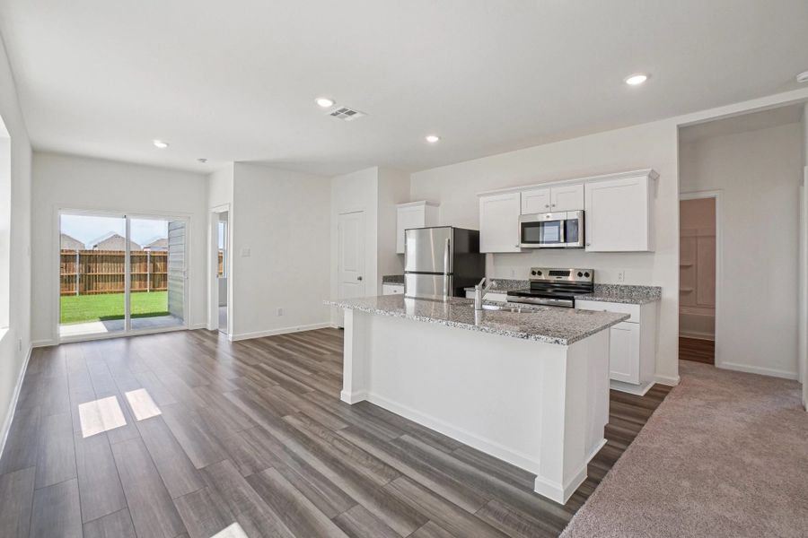 Representative furnished interior of a home built from the Odyssey by Starlight Homes in Williams Landing, Waller (Image 7).