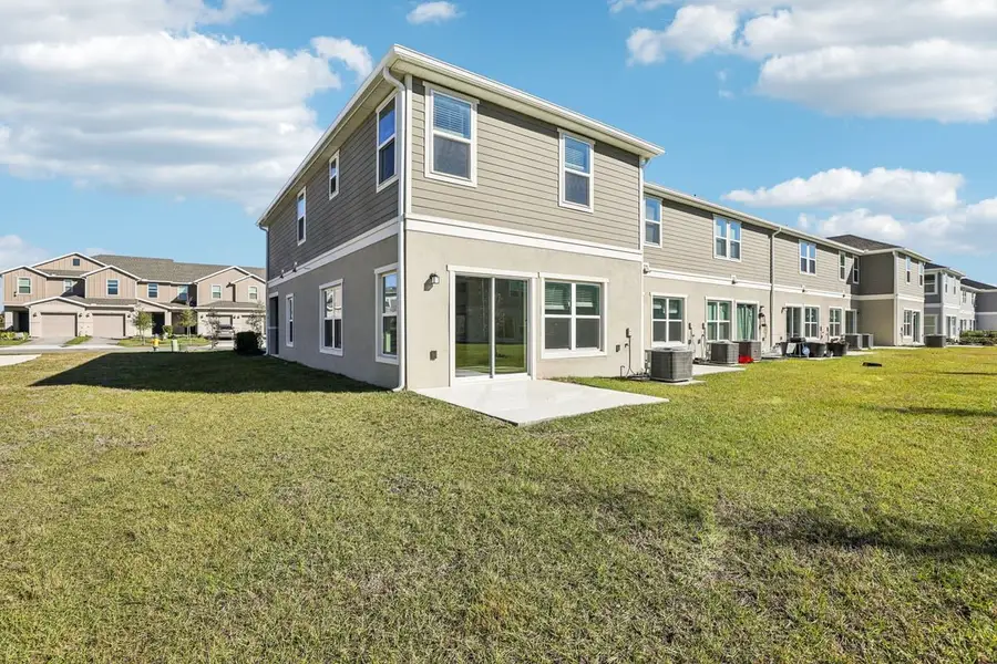 Exterior details and patio area of a home in Reserve at Forest Lake Townhomes, Lake Wales (Image 3). Exterior details and patio area of a home in Reserve at Forest Lake Townhomes, Lake Wales (Image 3).