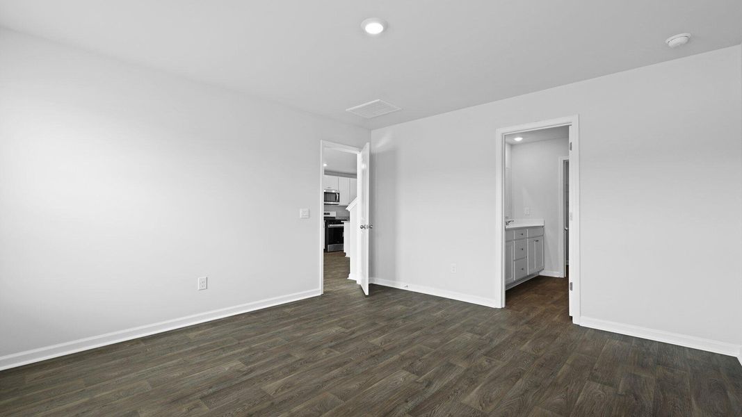 Spacious, unfurnished interior of a new home in Pine Hills Townhomes at Cane Bay, Summerville (Image 19). Spacious, unfurnished interior of a new home in Pine Hills Townhomes at Cane Bay, Summerville (Image 19).