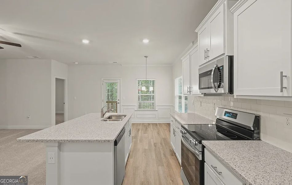 Furnished interior view inside a new home in Canterbury Villas, Carrollton (Image 9).