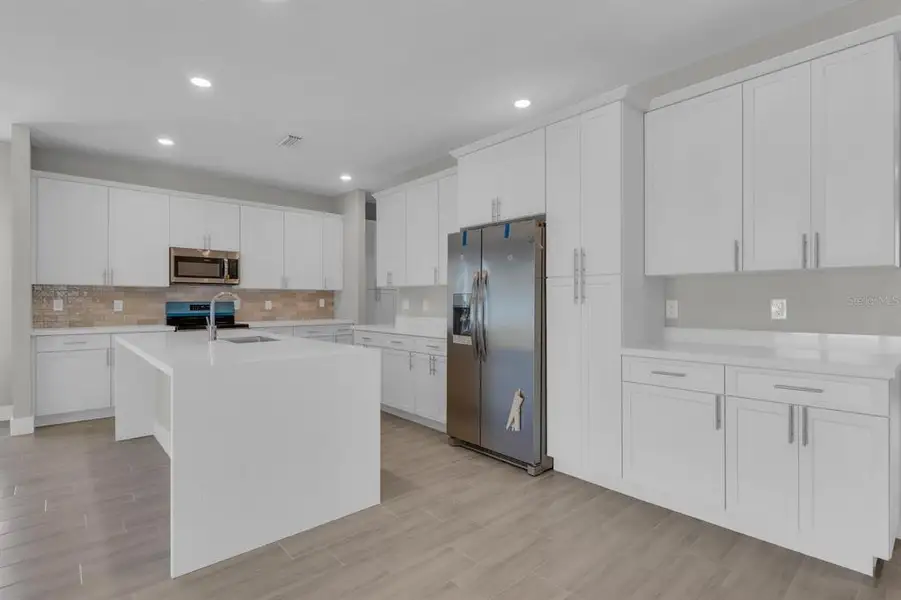 Furnished interior view inside a new home in , Palm Bay (Image 9). Furnished interior view inside a new home in , Palm Bay (Image 9).