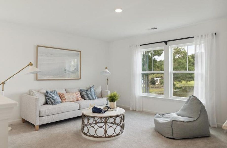 Furnished interior view inside a new home in Sweetgrass at Summers Corner, Summerville (Image 6).