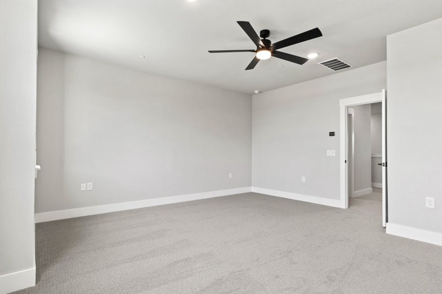 Spacious, unfurnished interior of a new home in The Tribute, The Colony (Image 35).