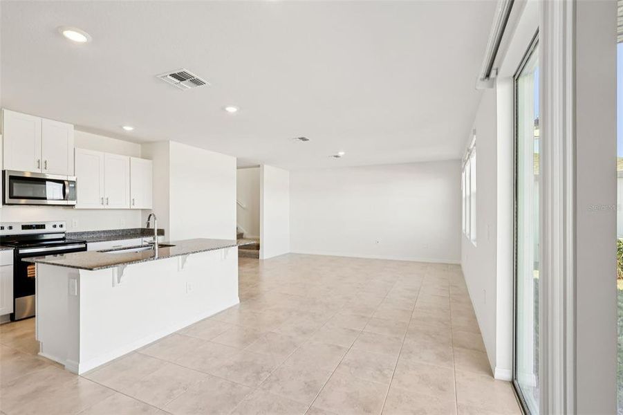 Furnished interior view inside a new home in , Poinciana (Image 5).