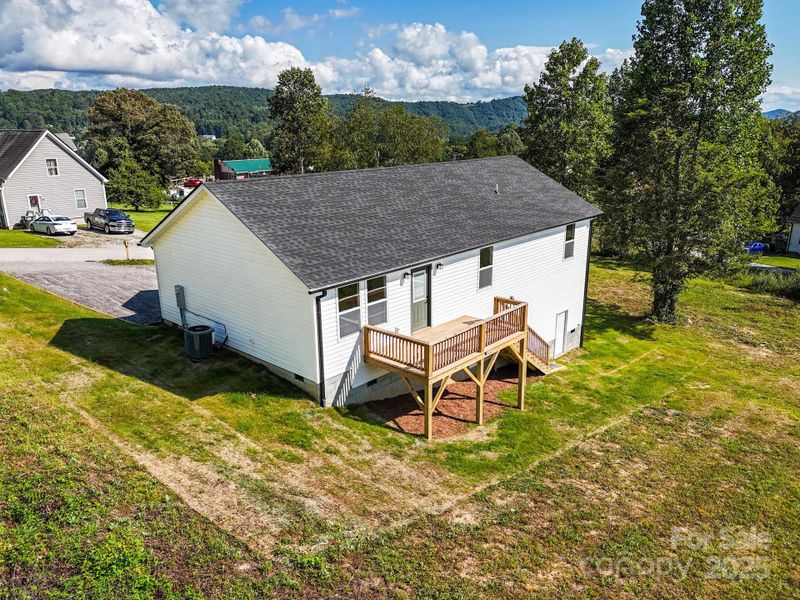 Front exterior of a new home in , Hendersonville, NC, highlighting curb appeal (Image 22).