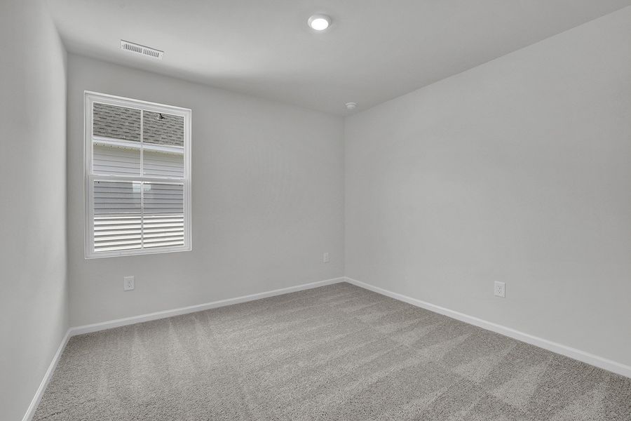 Spacious, unfurnished interior of a new home in River Tide Farms, Bolivia (Image 22).