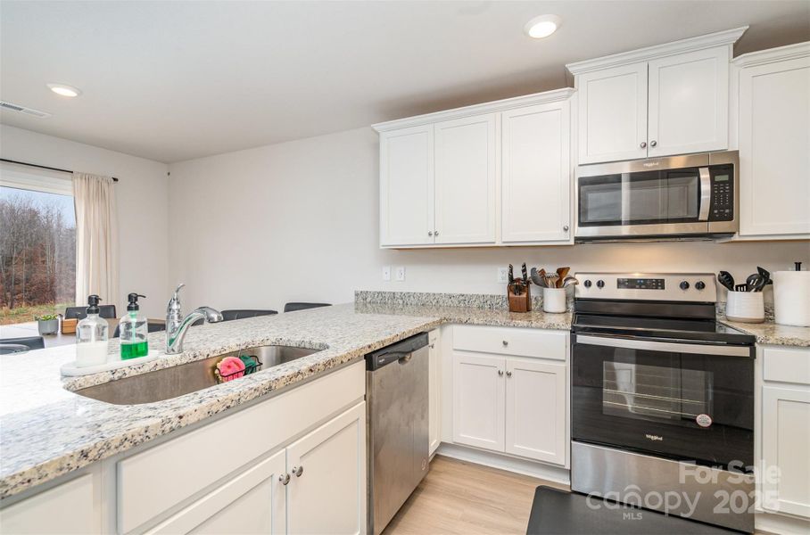 Furnished interior view inside a new home in , Charlotte (Image 7).