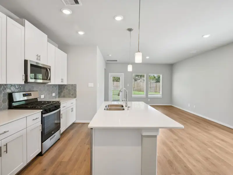 Furnished interior view inside a new home in Sanford Farms - Traditional Series, Waller (Image 3).