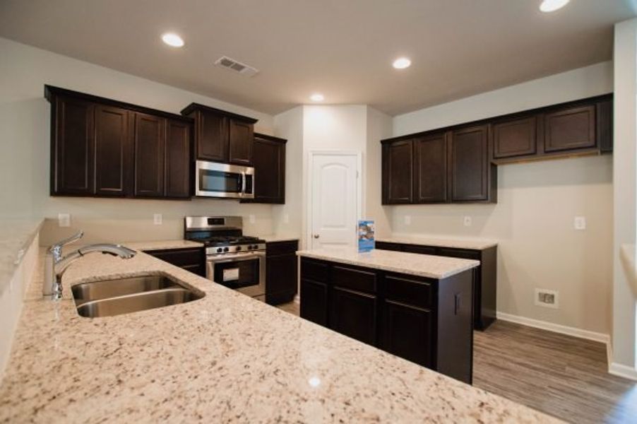 Representative furnished interior of a home built from the Crofton by Piedmont Residential in Hampton Ridge, Jefferson (Image 5).
