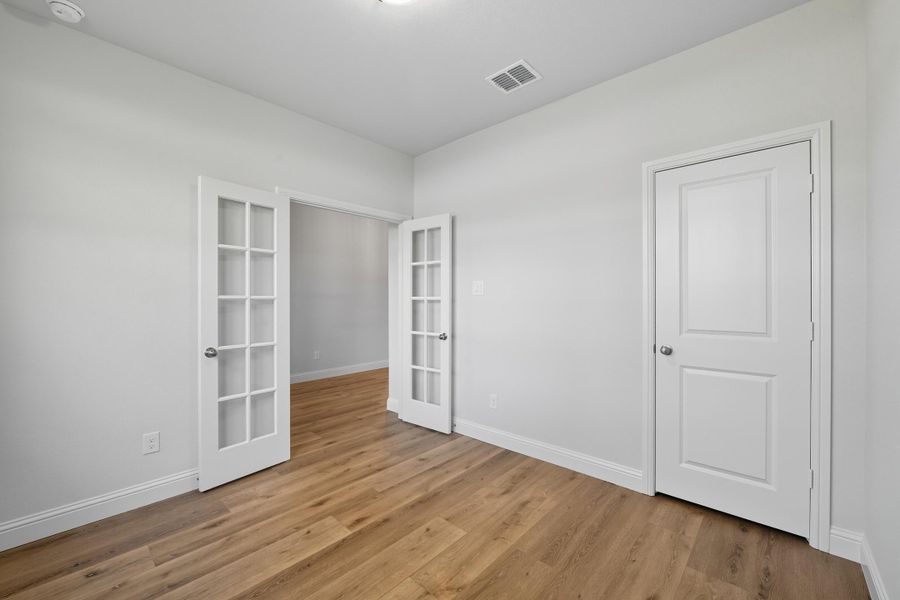 Representative unfurnished interior of a home built from the Garrison III by Cheldan Homes in Arbor Oaks, Boyd (Image 14).
