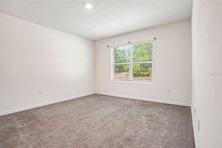 Spacious, unfurnished interior of a new home in Lake Diamond, Ocala (Image 21).