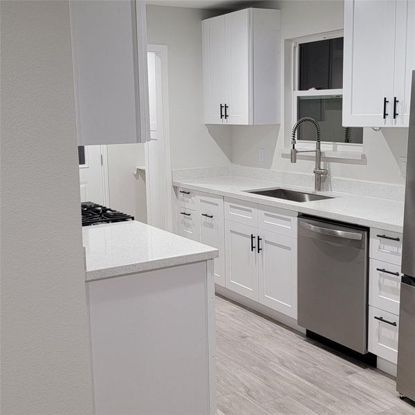 KITCHEN - MODEL HOME 114 (RT SIDE)