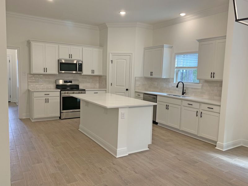 Furnished interior view inside a new home in Sentinel Ridge, Pace (Image 7).