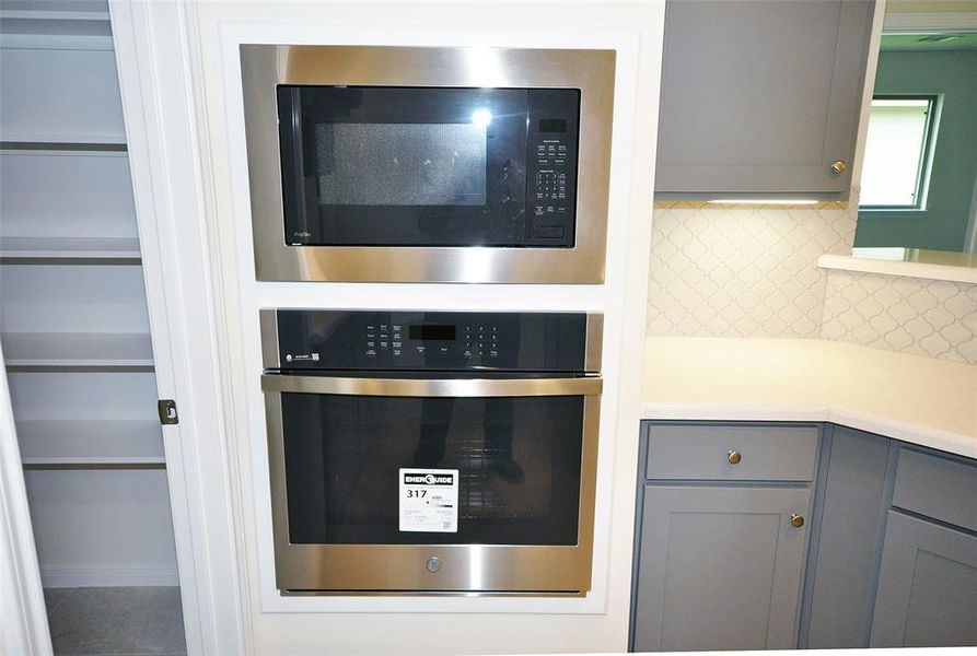 Built in self cleaning oven with microwave above.