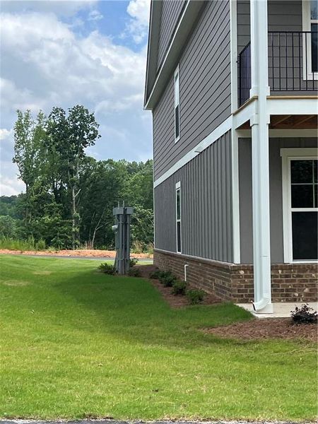 Front exterior of a new home in , Gainesville, GA, highlighting curb appeal (Image 1). Front exterior of a new home in , Gainesville, GA, highlighting curb appeal (Image 1).