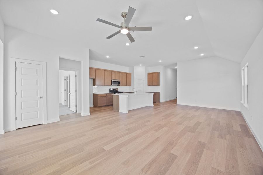 Living and Dining in the Quartz home plan by Trophy Signature Homes – REPRESENTATIVE PHOTO