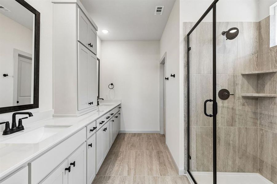 You will love the spacious walk in shower in this beautiful owner's bath. You will love the spacious walk in shower in this beautiful owner's bath.