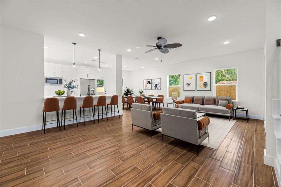 Spacious living room designed for comfort and style, featuring an open-concept layout that flows seamlessly into the kitchen and dining areas.*Virtually staged photo* Spacious living room designed for comfort and style, featuring an open-concept layout that flows seamlessly into the kitchen and dining areas.*Virtually staged photo*