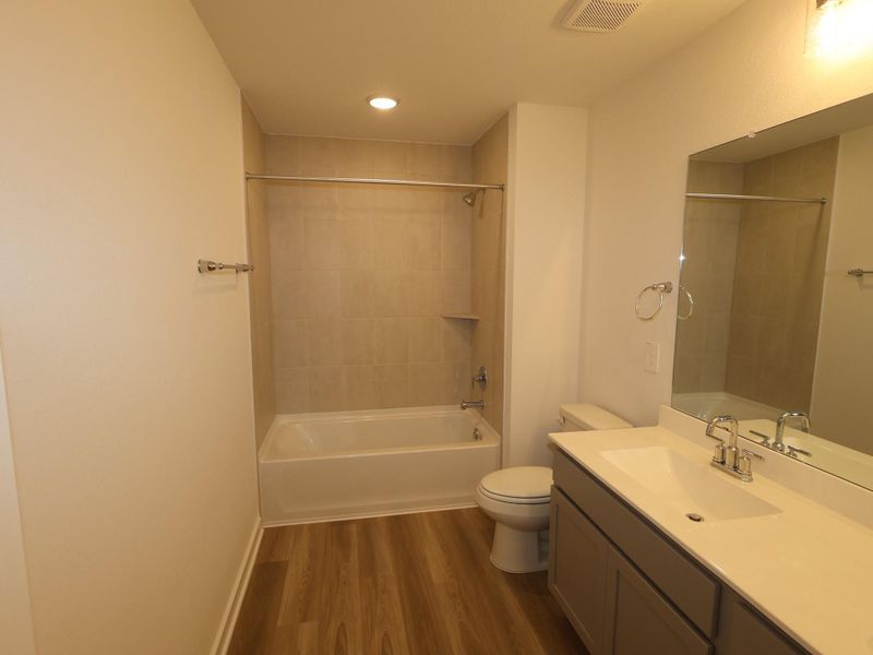 Furnished interior view inside a new home in Pinewood at Grand Texas, New Caney (Image 3).