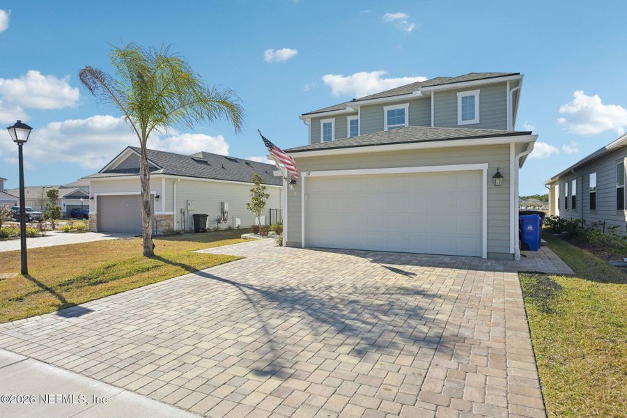 Front exterior of a new home in , St. Augustine, FL, highlighting curb appeal (Image 27).