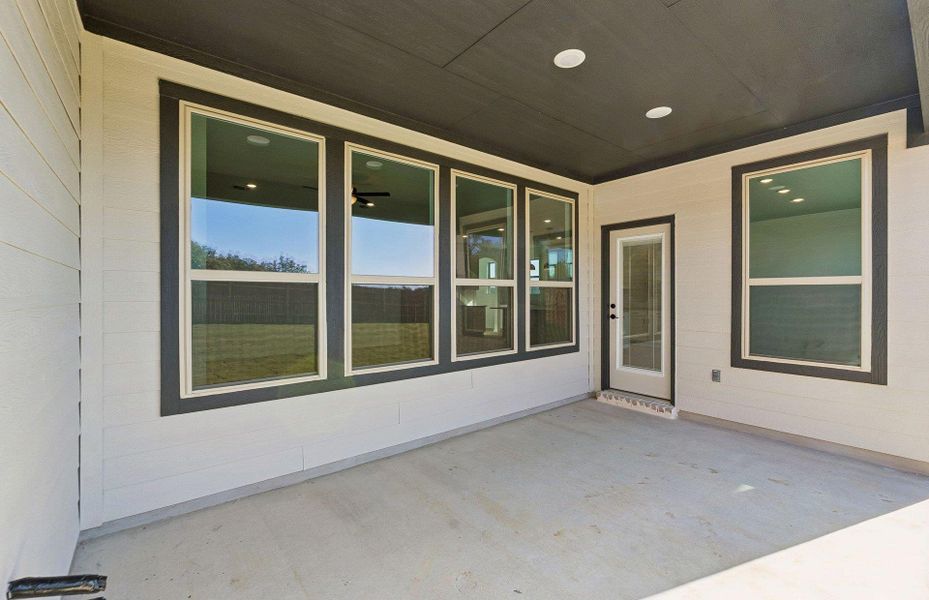 Exterior details and patio area of a home in Saddleback at Santa Rita Ranch, Liberty Hill (Image 26).